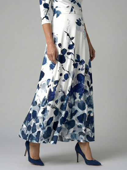 Celeste | Vestido Midi Floral con Escote Cruzado y Manga Tres Cuartos